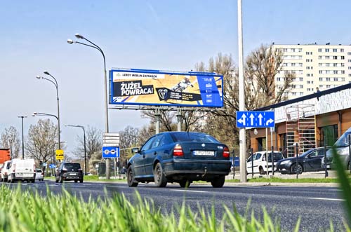 Reklama meczu żużlowego na billboardzie w mieście